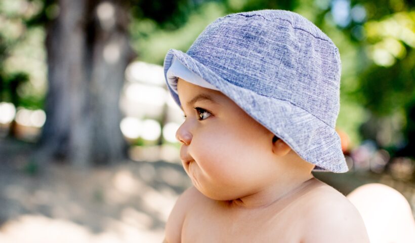 A baby wearing a hat