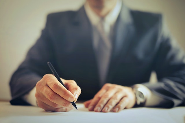 A person signing a legal document